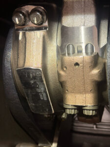 ADD-028 &middot; Connecting rod and crankcase detail &middot; Unit assignment undetermined; not additional inventory.