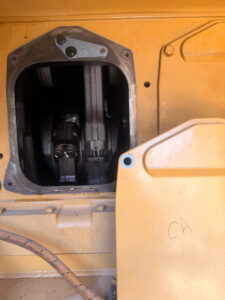 ADD-007 &middot; Open crankcase inspection port &middot; Unit assignment undetermined; not additional inventory.